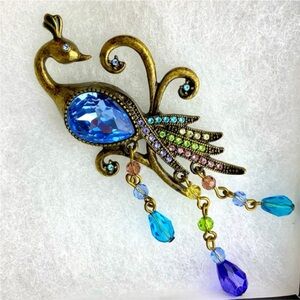 Vintage peacock brooch, brass tone